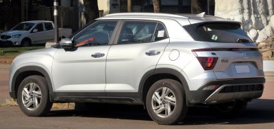 Silver SUV rear and side view with taillights and alloy wheels