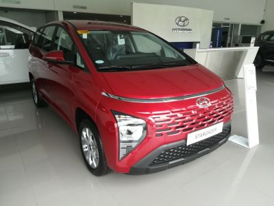 Close-up of front view with bold grille and angular headlights
