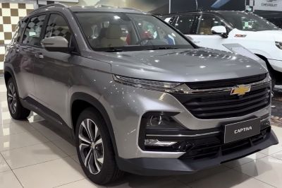 Front view showing sleek LED headlights and bold grille design