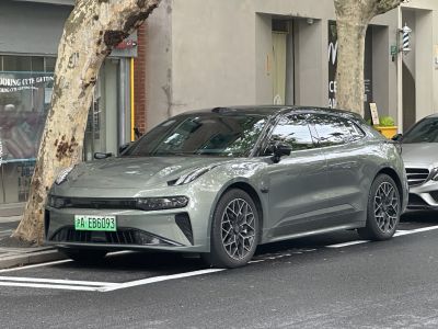 Aerodynamic electric hatchback with LED headlights and multi-spoke wheels