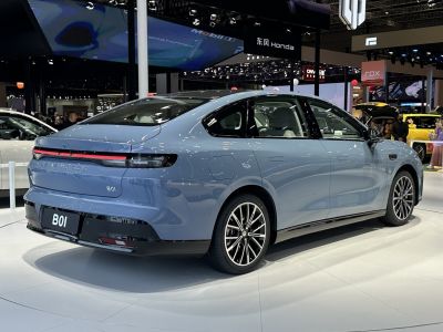 Sleek rear LED taillight and aerodynamic side profile of a modern sedan