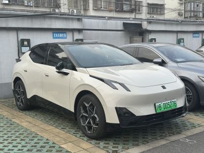 Sleek front and side profile of electric SUV with modern headlights and alloy wheels
