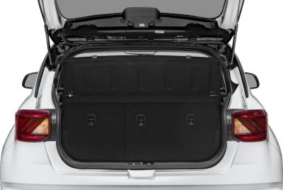 Rear view of a car with open trunk and visible tail lights