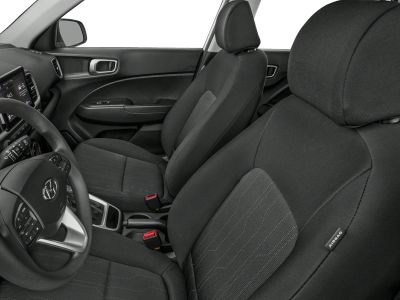 Front fabric seats and dashboard with steering wheel controls