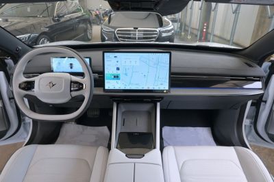 Modern car interior with large touchscreen and digital instrument cluster