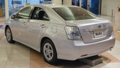 Rear quarter view with LED tail lights and aerodynamic design.