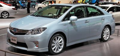 Sleek hybrid sedan with aerodynamic body and alloy wheels