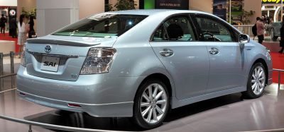 Rear view of mid-size sedan with alloy wheels and aerodynamic design