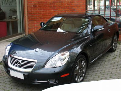 Luxury convertible coupe with chrome grille and alloy wheels