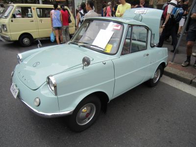 Vintage microcar with rear engine and compact body design