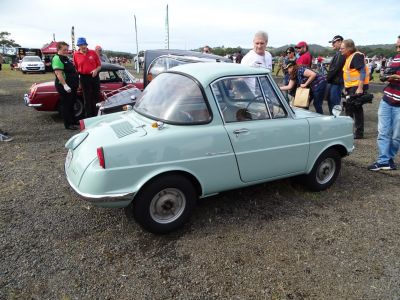 Vintage compact classic car rear and side view at outdoor show