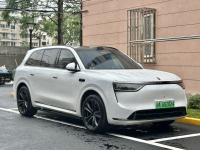 Front-side view with LED headlights and sleek SUV design