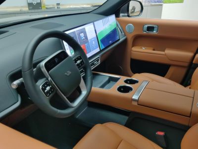 Modern digital dashboard and premium brown leather interior