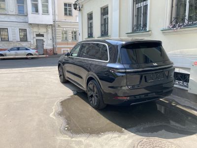 Black SUV rear with tinted windows and LED taillights