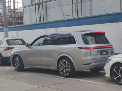 Rear side view of a modern SUV with LED tail lights and alloy wheels