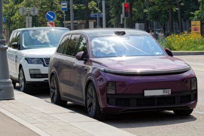 Electric SUV front fascia and side profile on city street