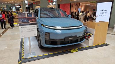 Sleek front design with LED bar headlight and aerodynamic styling