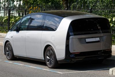 Sleek rear and side design of futuristic electric MPV