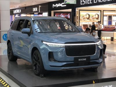 SUV with LED strip headlights and honeycomb front grille