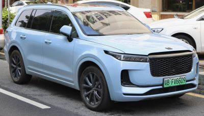 SUV with modern front grille and slim LED headlights