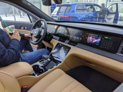 Panoramic digital dashboard and beige leather seats