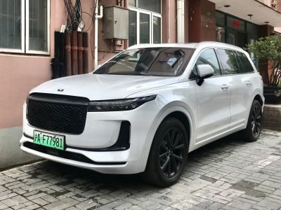 Electric SUV with sleek front grille and LED headlights