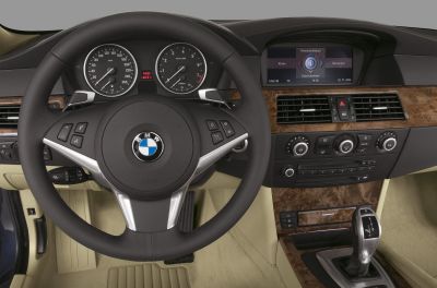 Dashboard, steering wheel, and center console with navigation screen