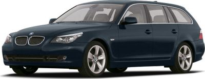 Sleek wagon design with dynamic headlights and alloy wheels