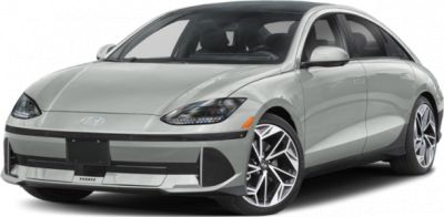 Front view of sleek electric sedan with LED headlights and aerodynamic shape