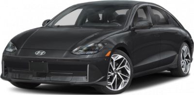 Sleek electric sedan front-side view with aerodynamic shape and LED headlights