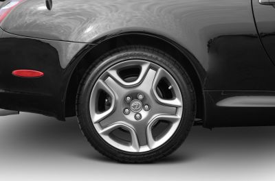 Close-up of a Lexus SC II alloy wheel with Dunlop tire