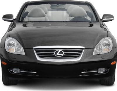 Front view of a convertible with distinct grille and headlights
