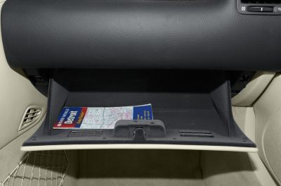Glove box interior with soft lining and storage space