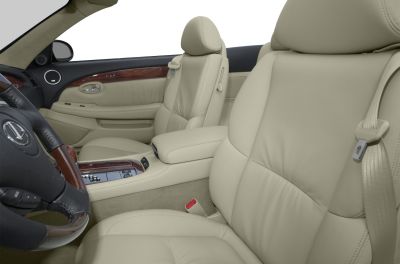 Beige leather seats with wood trim and luxury interior details