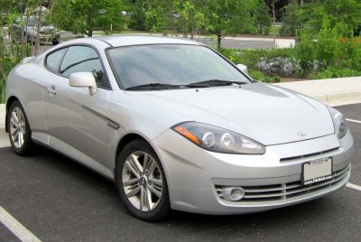 Silver 2007 coupe with aerodynamic body and alloy wheels