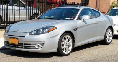 Silver coupe with alloy wheels and sunroof
