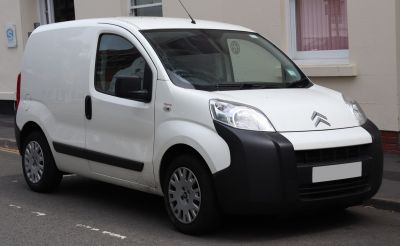 White panel van with distinctive large black front bumper and compact cargo design