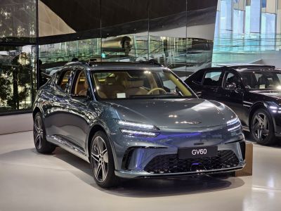 Front view of an electric SUV with LED headlights and aerodynamic design