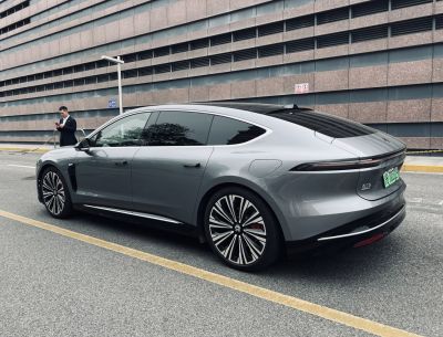 Luxury electric sedan with aerodynamic body and alloy wheels