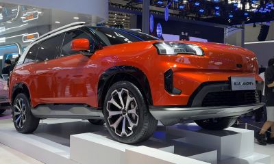 Angular SUV front side with modern LED headlights and large alloy wheels