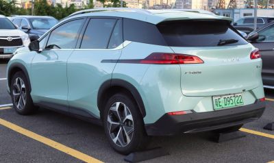Rear and side profile of a 2021 electric SUV with distinctive taillights and aerodynamic shape