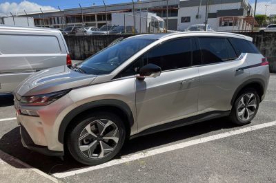 Silver crossover SUV with sporty alloy wheels and sleek tinted windows.