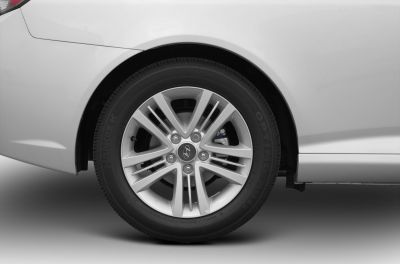 Close-up of alloy wheel and tire with detailed rim design