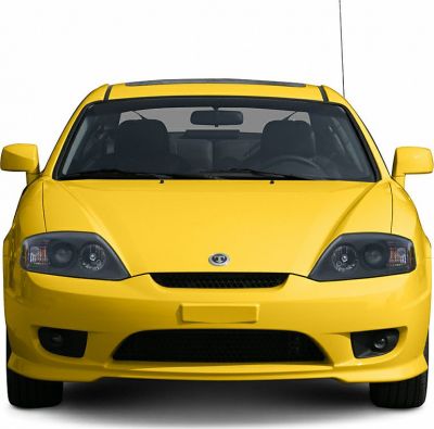 Front view of yellow coupe with sporty headlights and grille