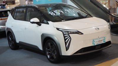 Sleek front LED light design and aerodynamic white compact SUV profile