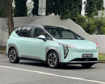 Angular LED headlights and two-tone roof on an electric MPV.