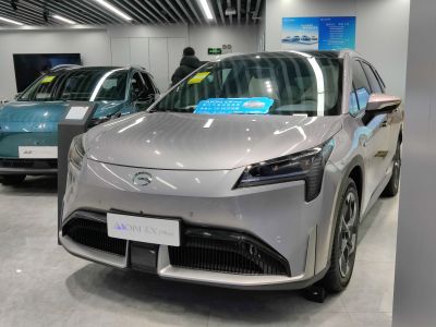 Front view of an electric SUV with sleek LED headlights and aerodynamic design
