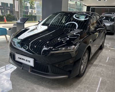 Modern electric sedan front with sharp LED headlights