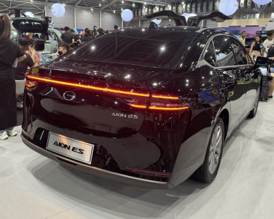 Sleek rear with continuous LED tail light strip and aerodynamic body shape.