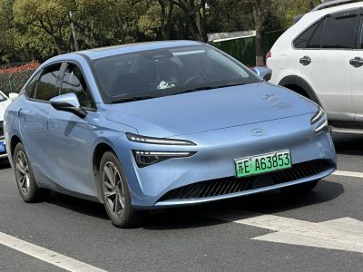 Front view of electric sedan with slim LED headlights and aerodynamic styling